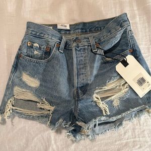 Levi’s 501 high rise distressed Jean shorts